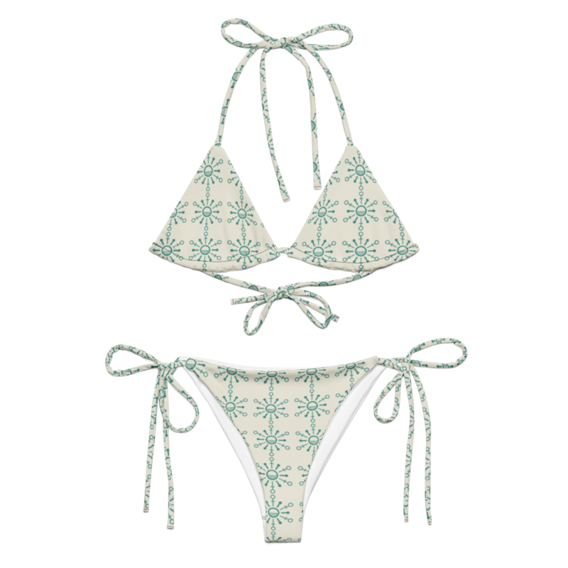 NanoBikini printed with the tiled NanoCorp sun mark, top and bottoms.