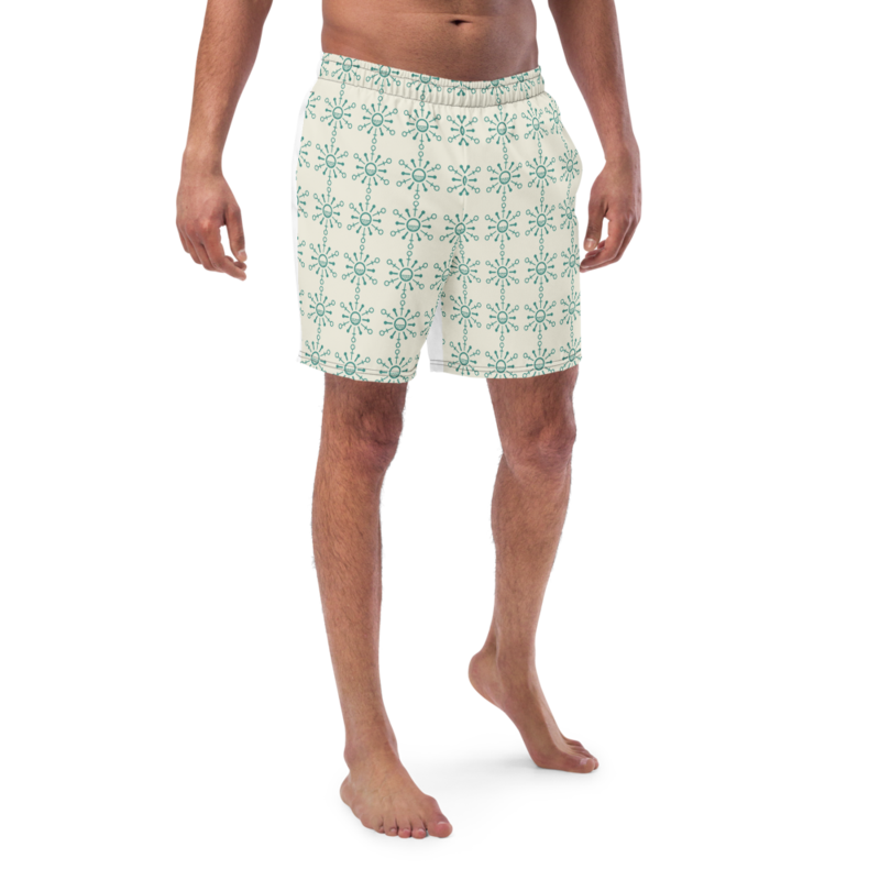 NanoShort printed with the tiled NanoCorp sun mark, worn poolside in hard summer light.